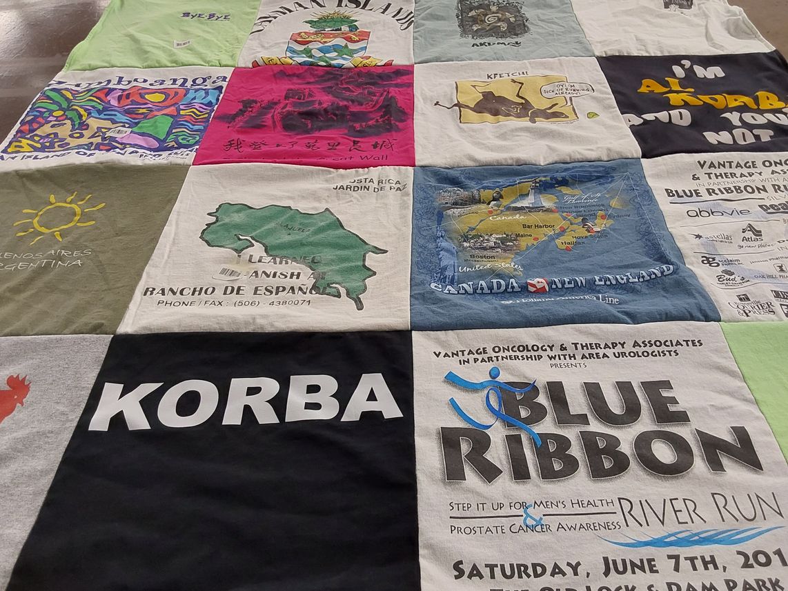 T-shirt quilt with travel, cultural exchange themes by Rebecca from IN