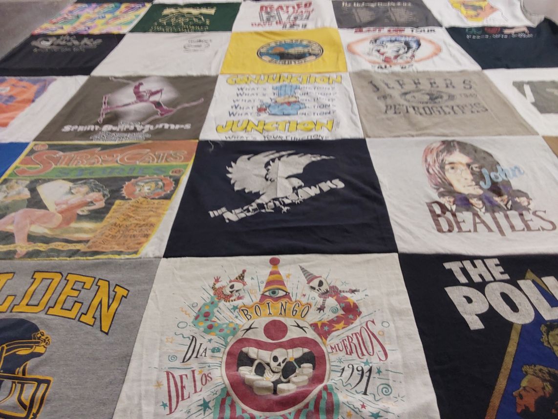 T-shirt quilt with music, theater themes by Terre from CA