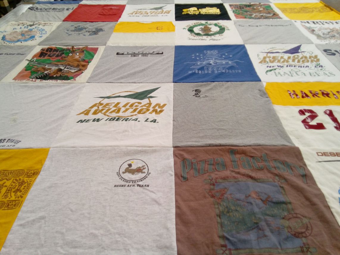 T-shirt quilt with aviation, cooking themes by Lynette from UT