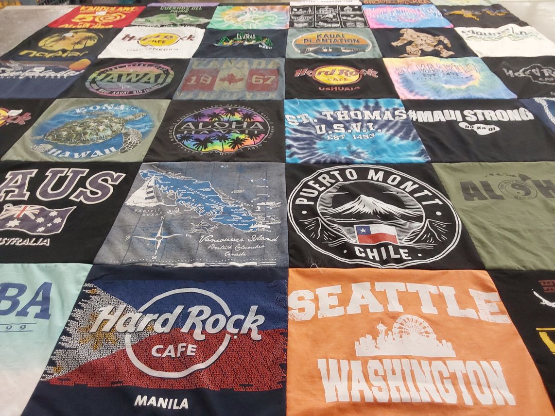 T-shirt quilt with travel, tourism themes by Kenneth from WA