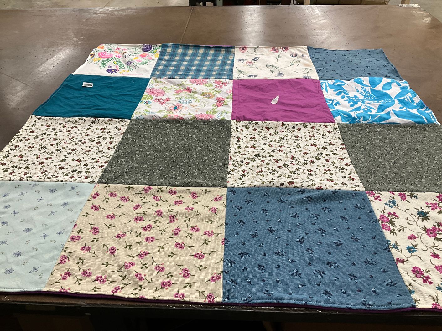 T-shirt quilt with quilting, sewing themes by Bonnie from NH