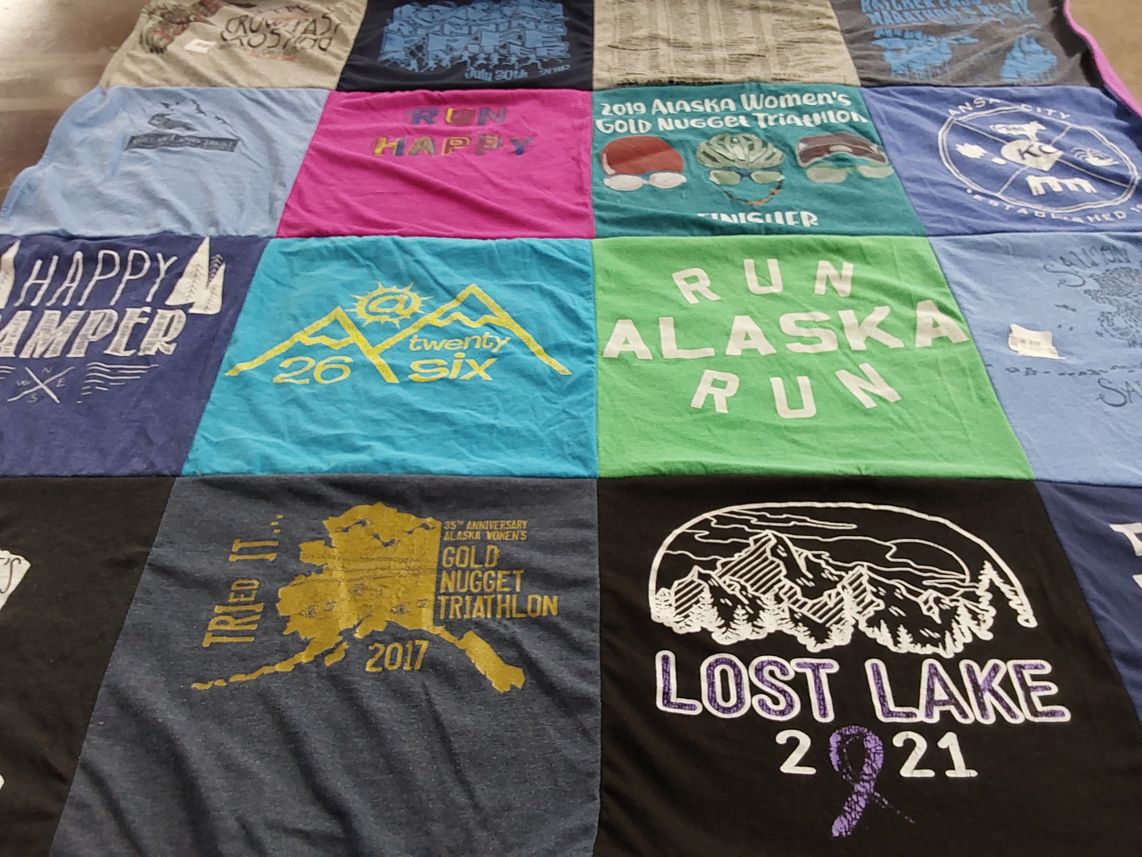 T-shirt quilt with running, camping themes by Laurel from AK
