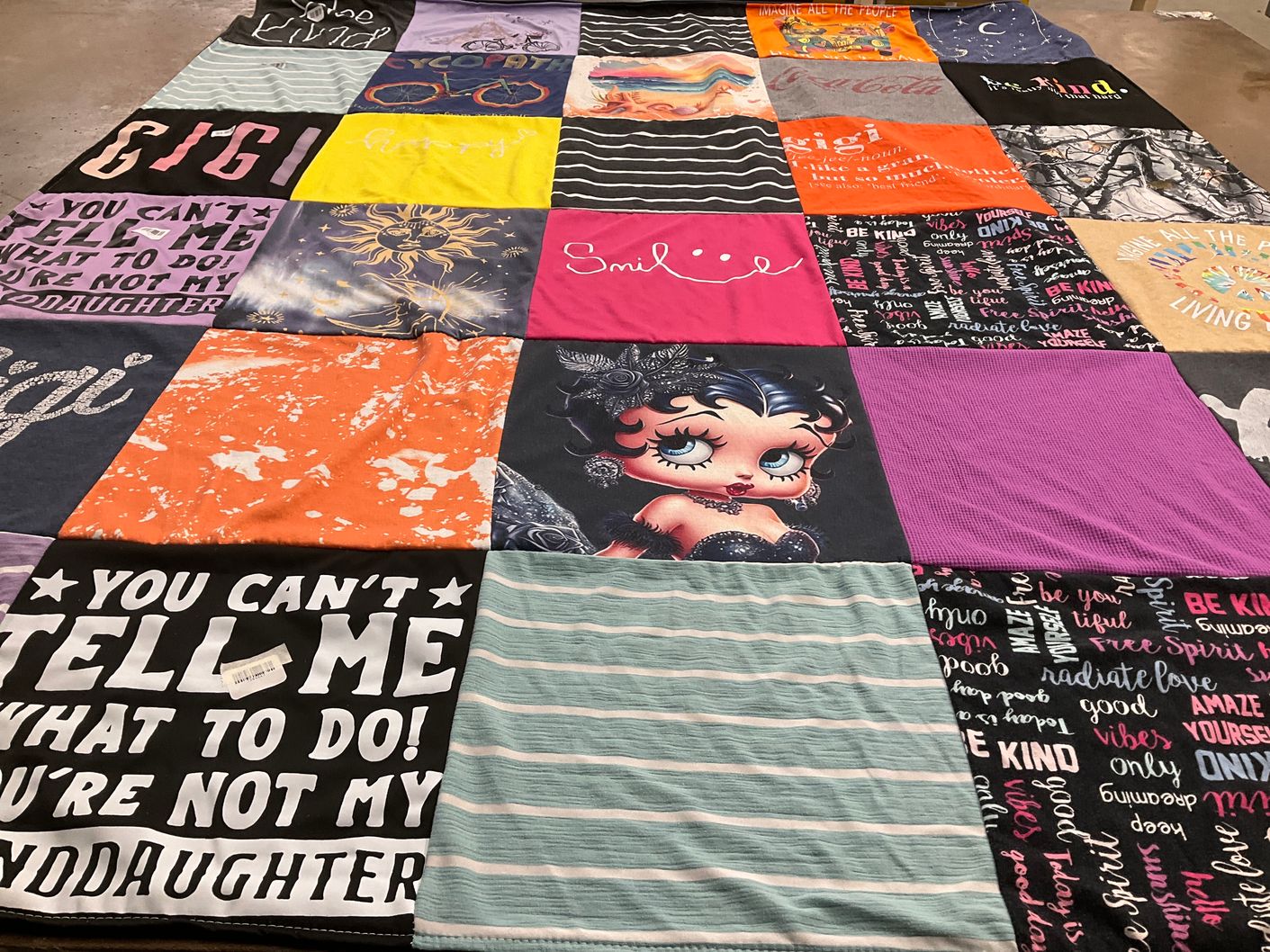 T-shirt quilt with self-expression, positivity themes by Brooke from TX