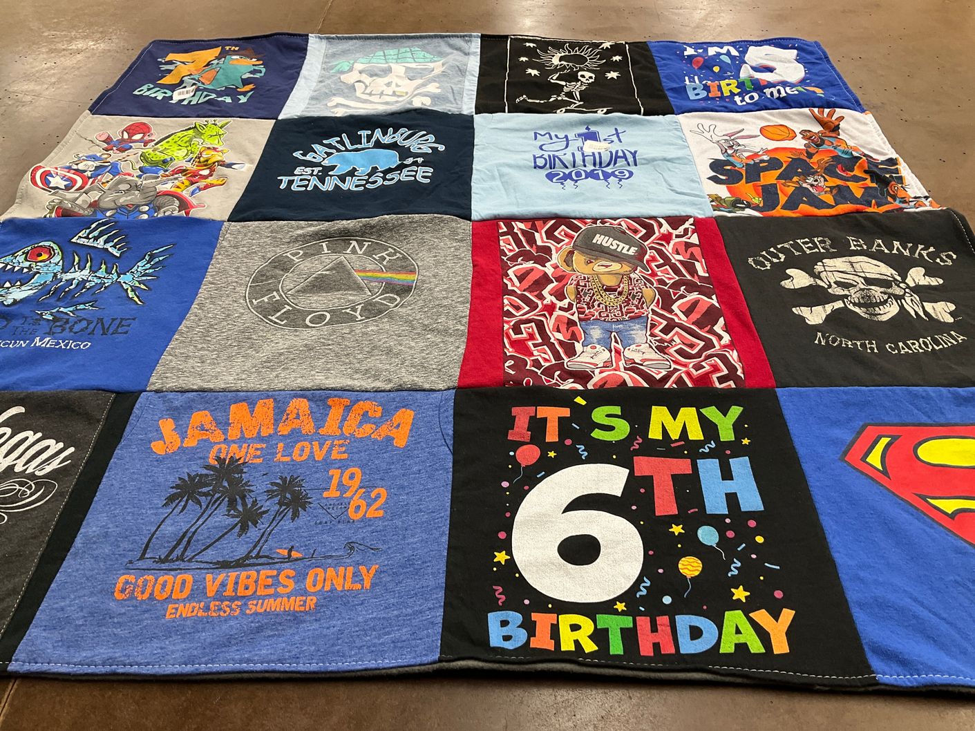 T-shirt quilt with music, travel themes by Jacqueline from MD