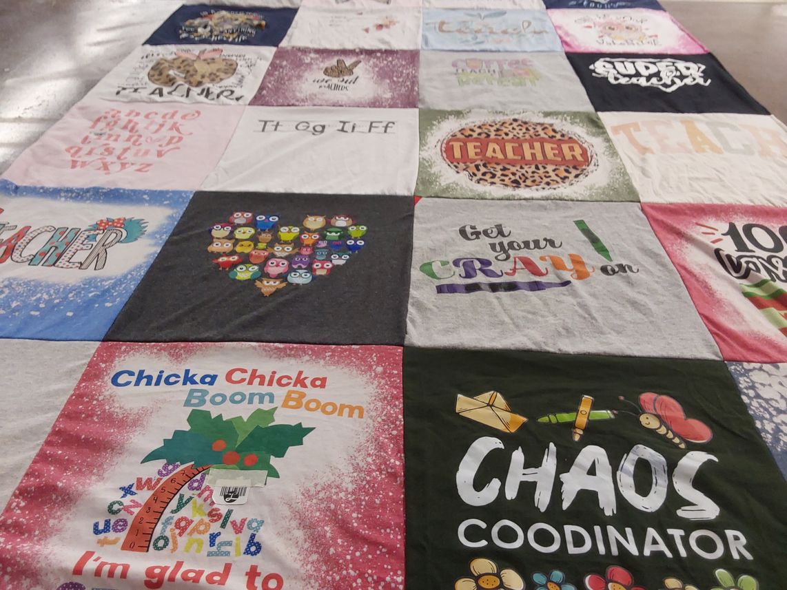 T-shirt quilt with teaching, education themes by Amy from KY