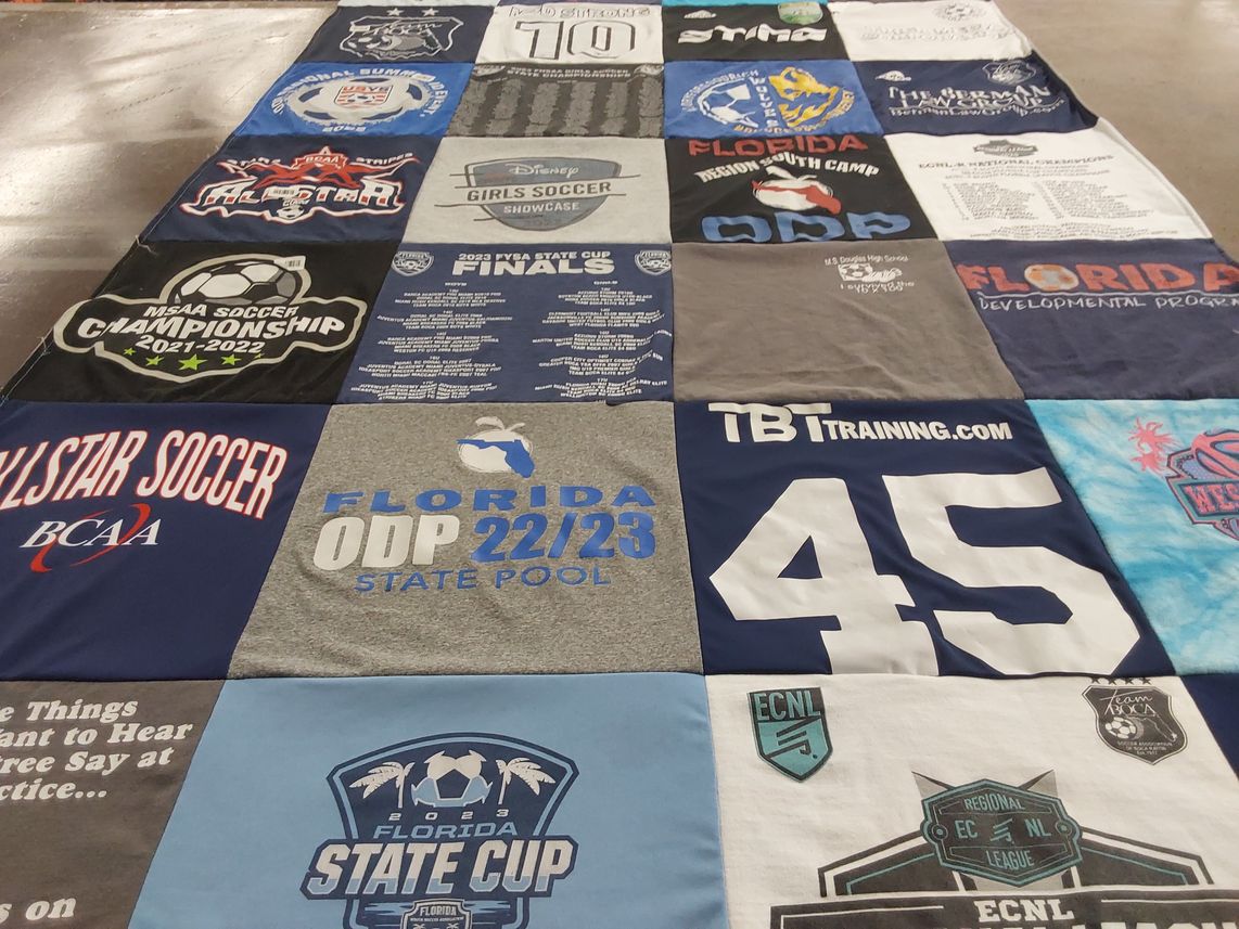 T-shirt quilt with soccer themes by Donna from FL