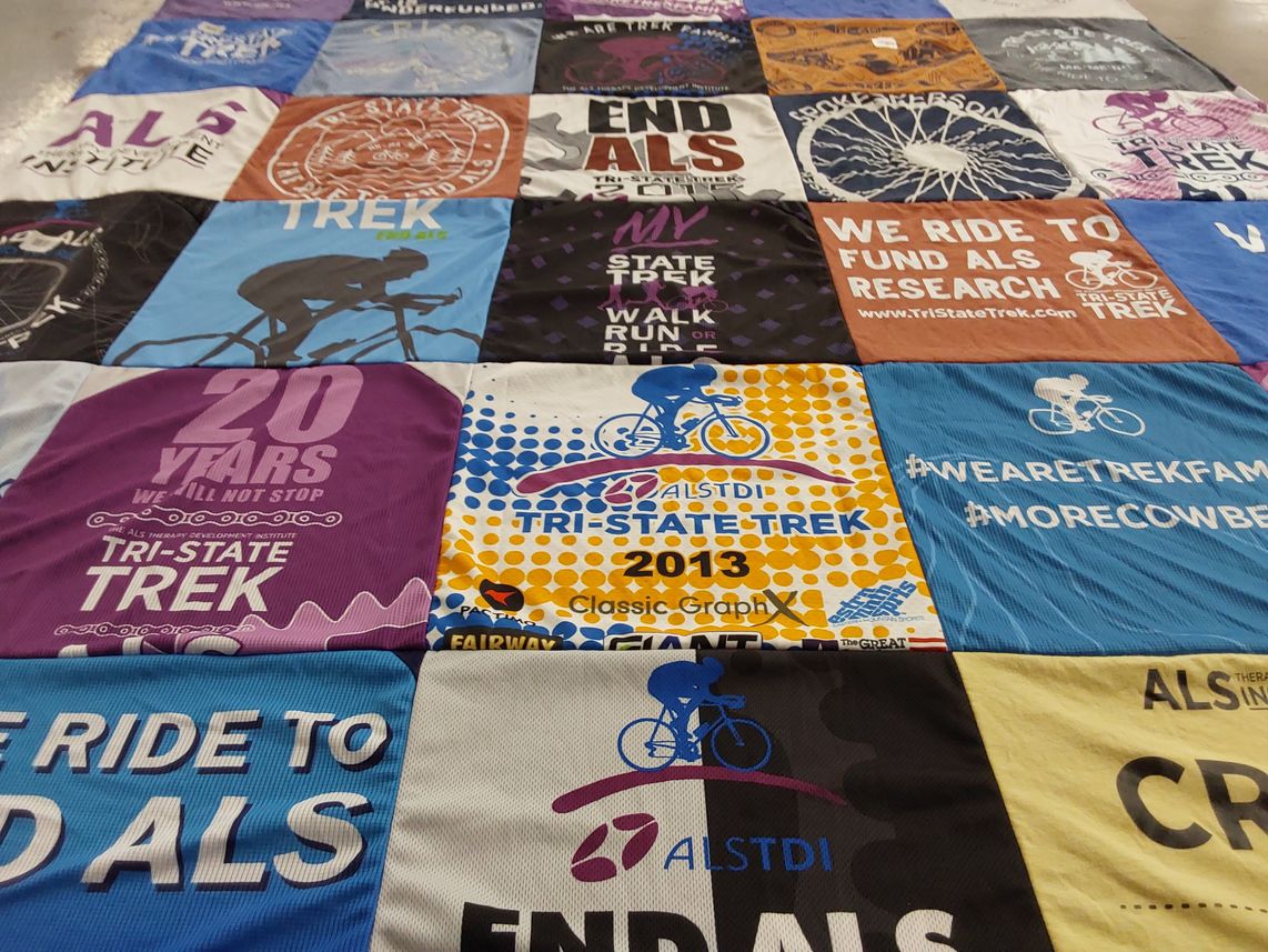 T-shirt quilt with als research, charity cycling themes by Valerie from MA