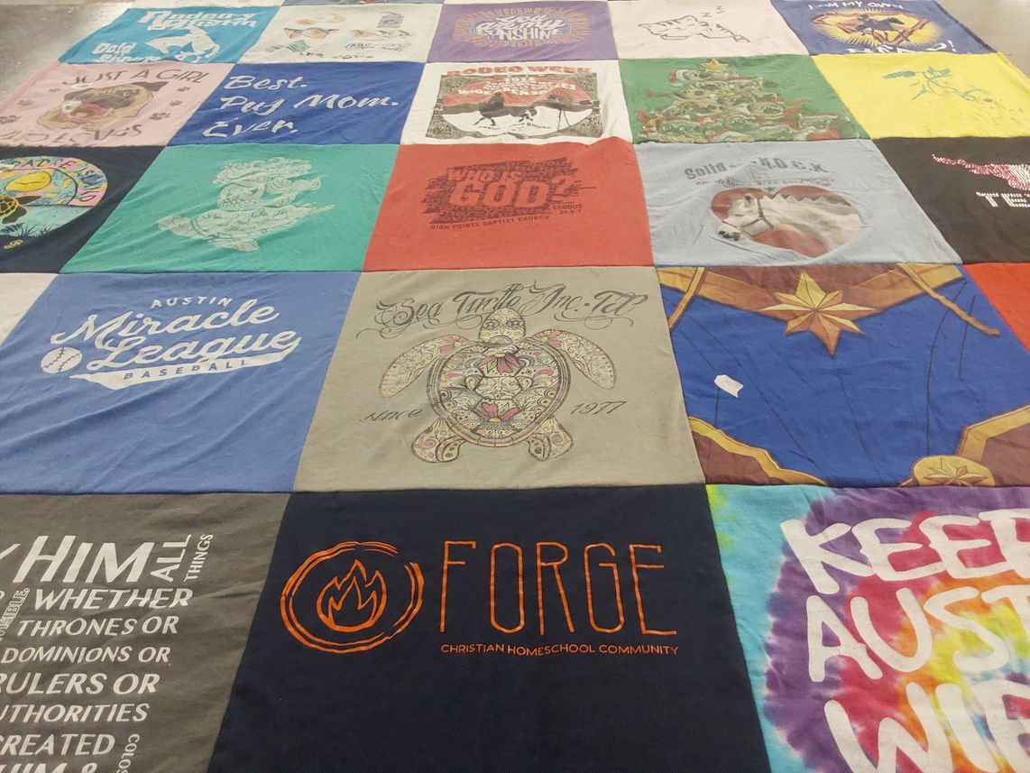 T-shirt quilt with baseball, homeschooling themes by Anne from TX