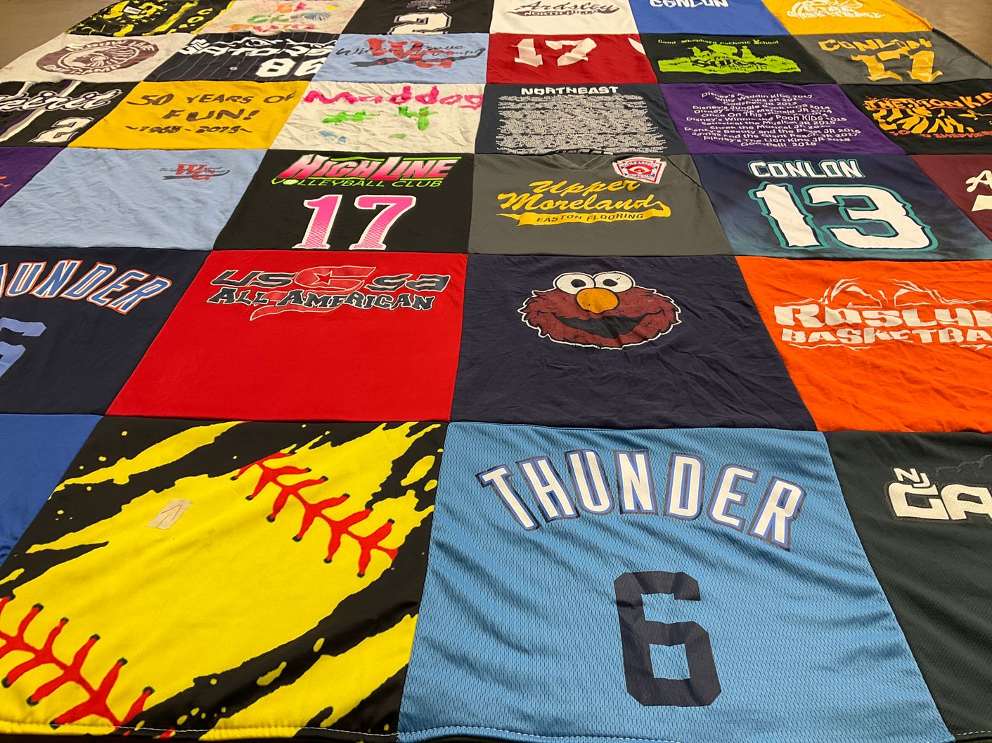 T-shirt quilt with sports, volleyball themes by Laura from PA