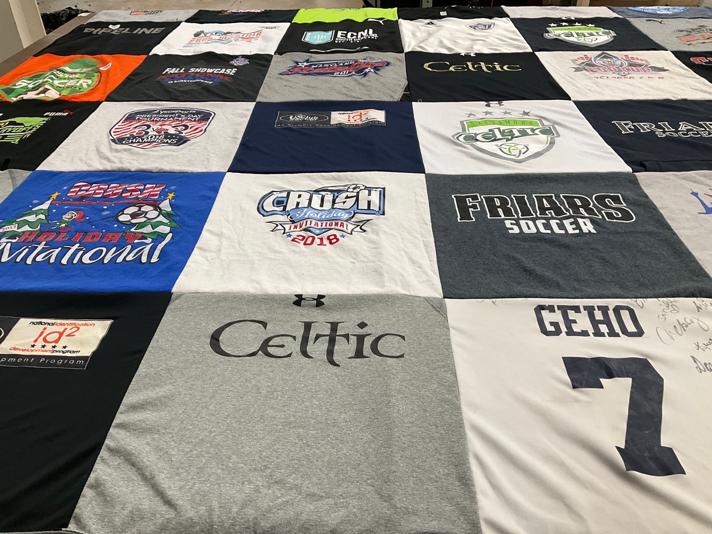 T-shirt quilt with soccer themes by kimberly from MD