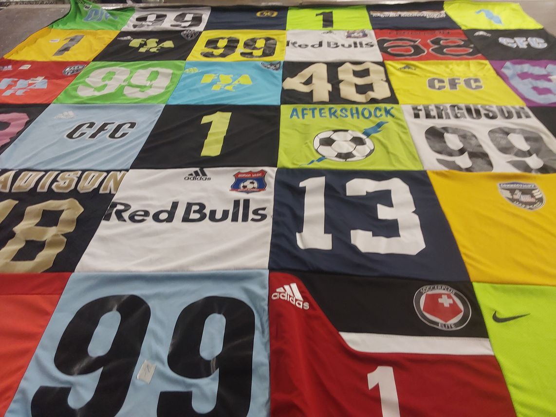 T-shirt quilt featuring red bulls by Erik from GA