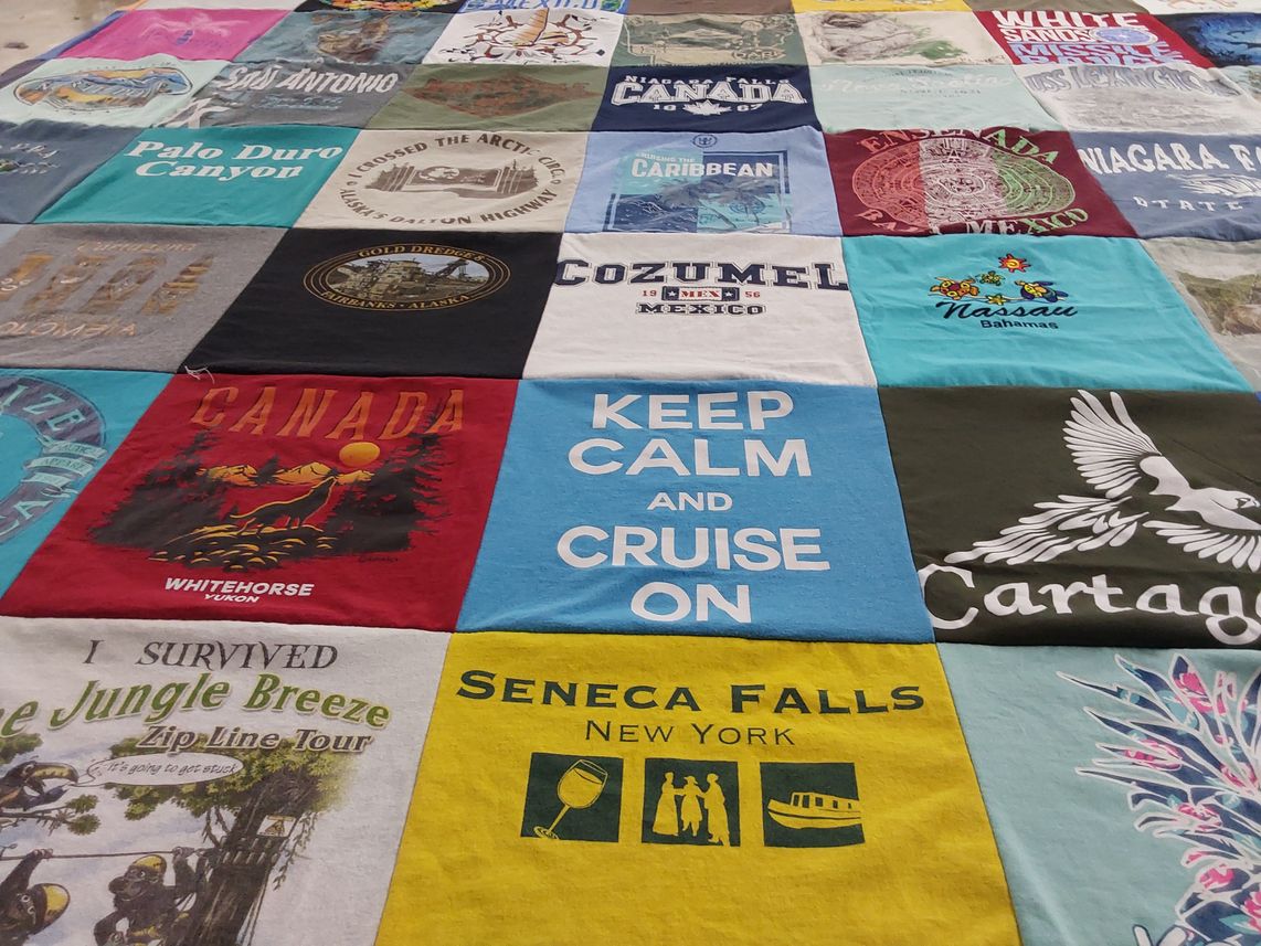 T-shirt quilt with travel, tourism themes by Donna from AR