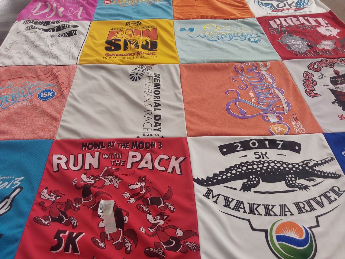 T-shirt quilt with running, sports themes by Doris from FL