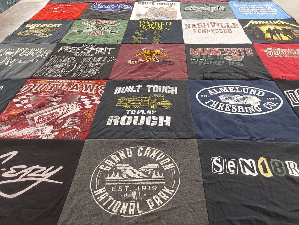 T-shirt quilt with music, racing themes by KIRA from MN
