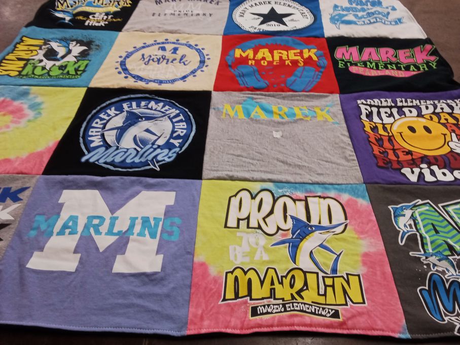 T-shirt quilt featuring marek elementary marlins by Leah from TX