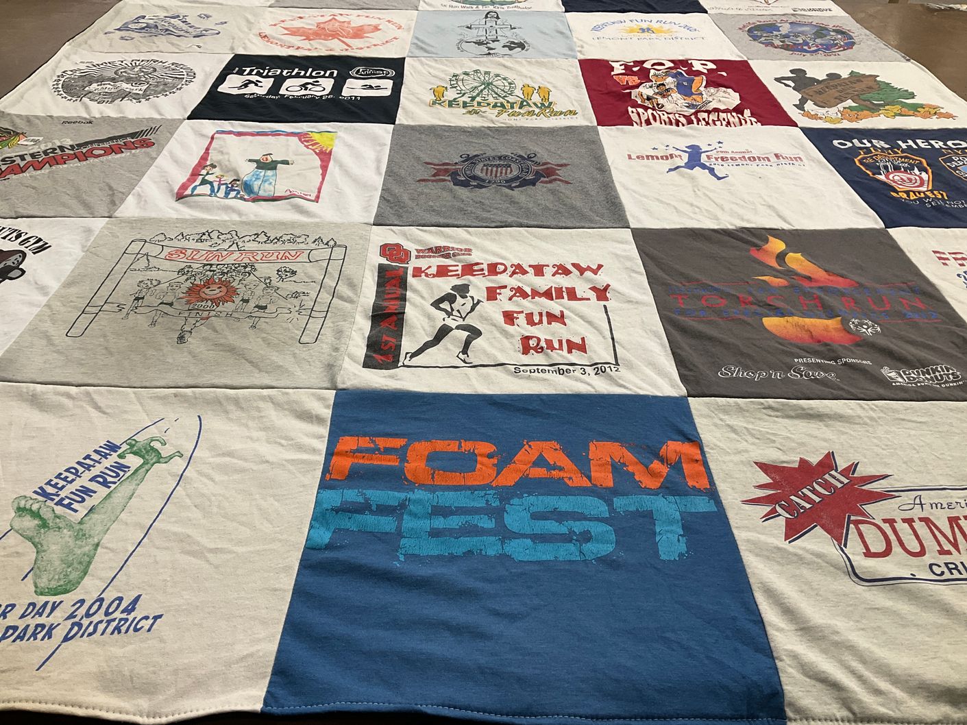 T-shirt quilt with running, triathlon themes by Lisa from IL