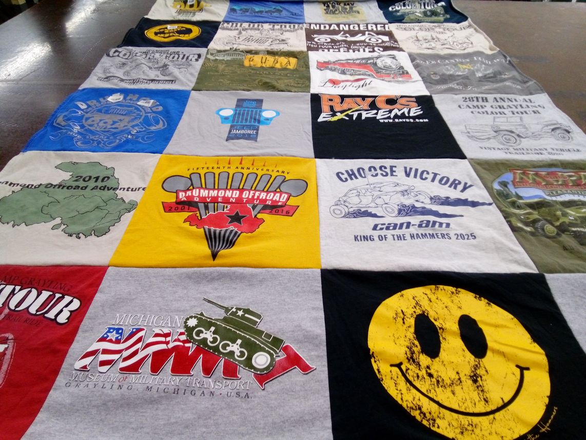 T-shirt quilt with offroading, outdoor adventure themes by kathryn from MI