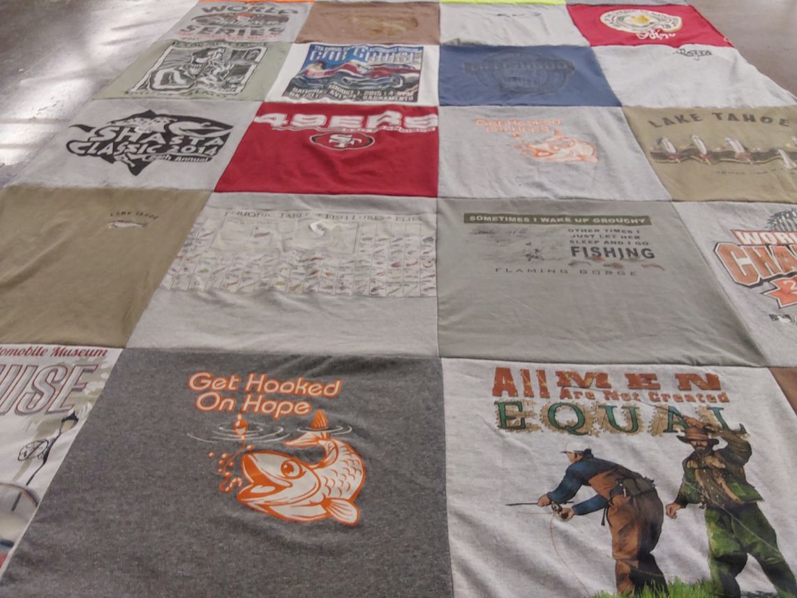 T-shirt quilt with fishing, outdoors themes by Kathleen from CA