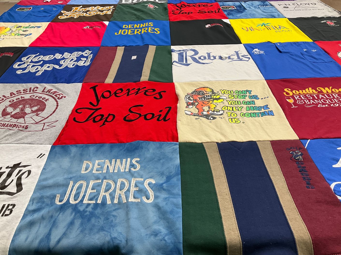 T-shirt quilt with sports, restaurants themes by Brad from WI