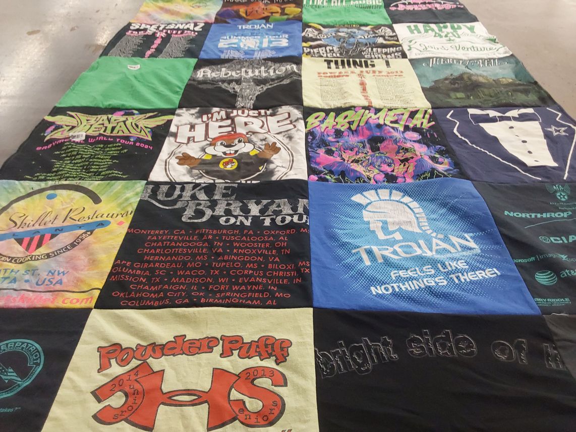 T-shirt quilt featuring trojan by Karina from NC