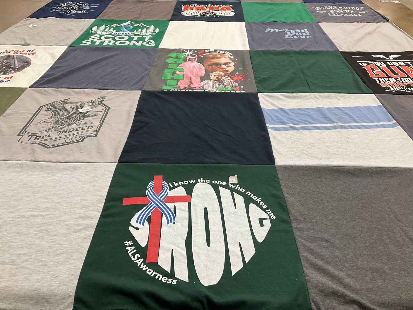 T-shirt quilt with awareness, community support themes by Barbara from AZ