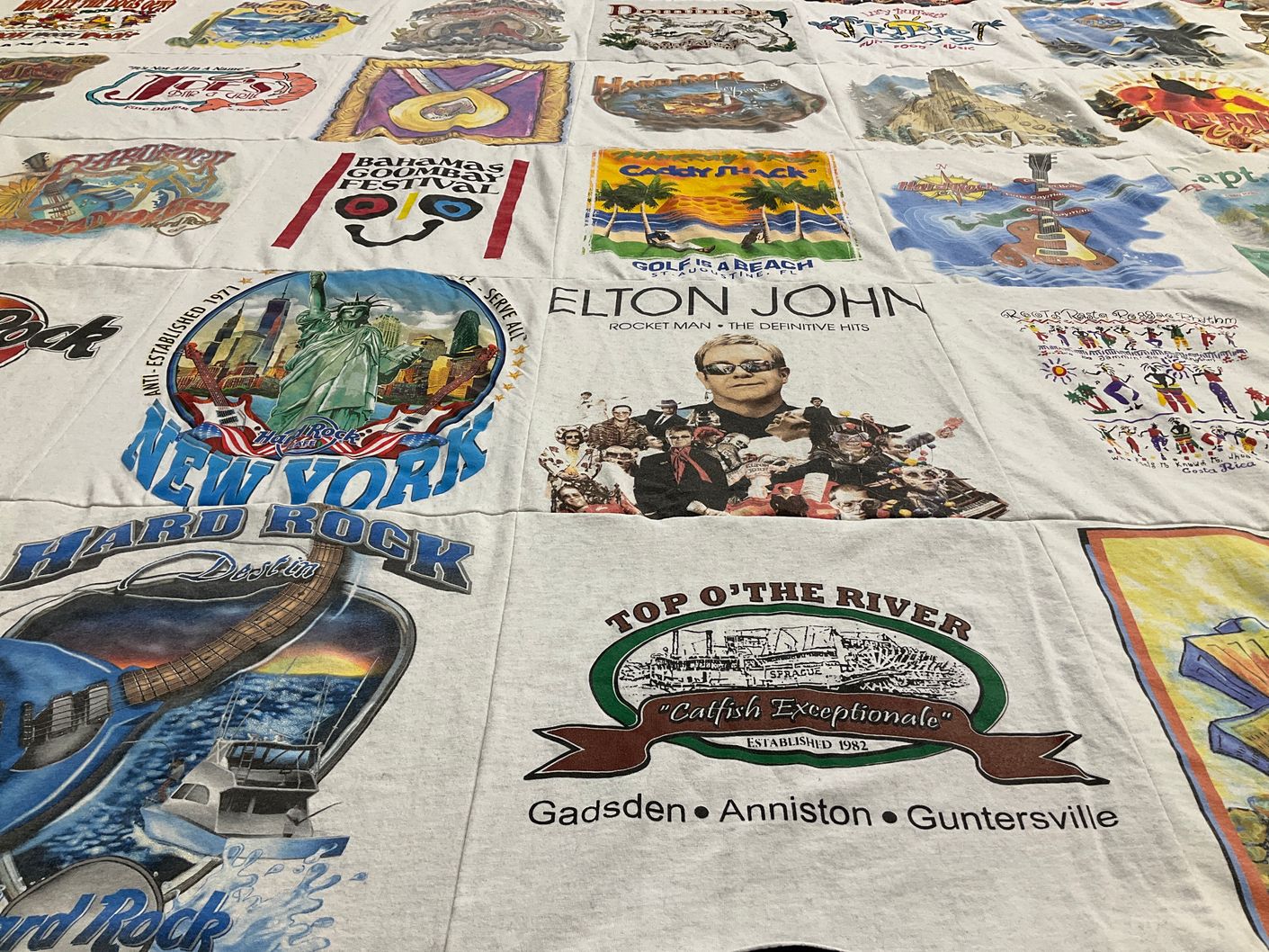 T-shirt quilt with music, travel themes by Lisa from AL