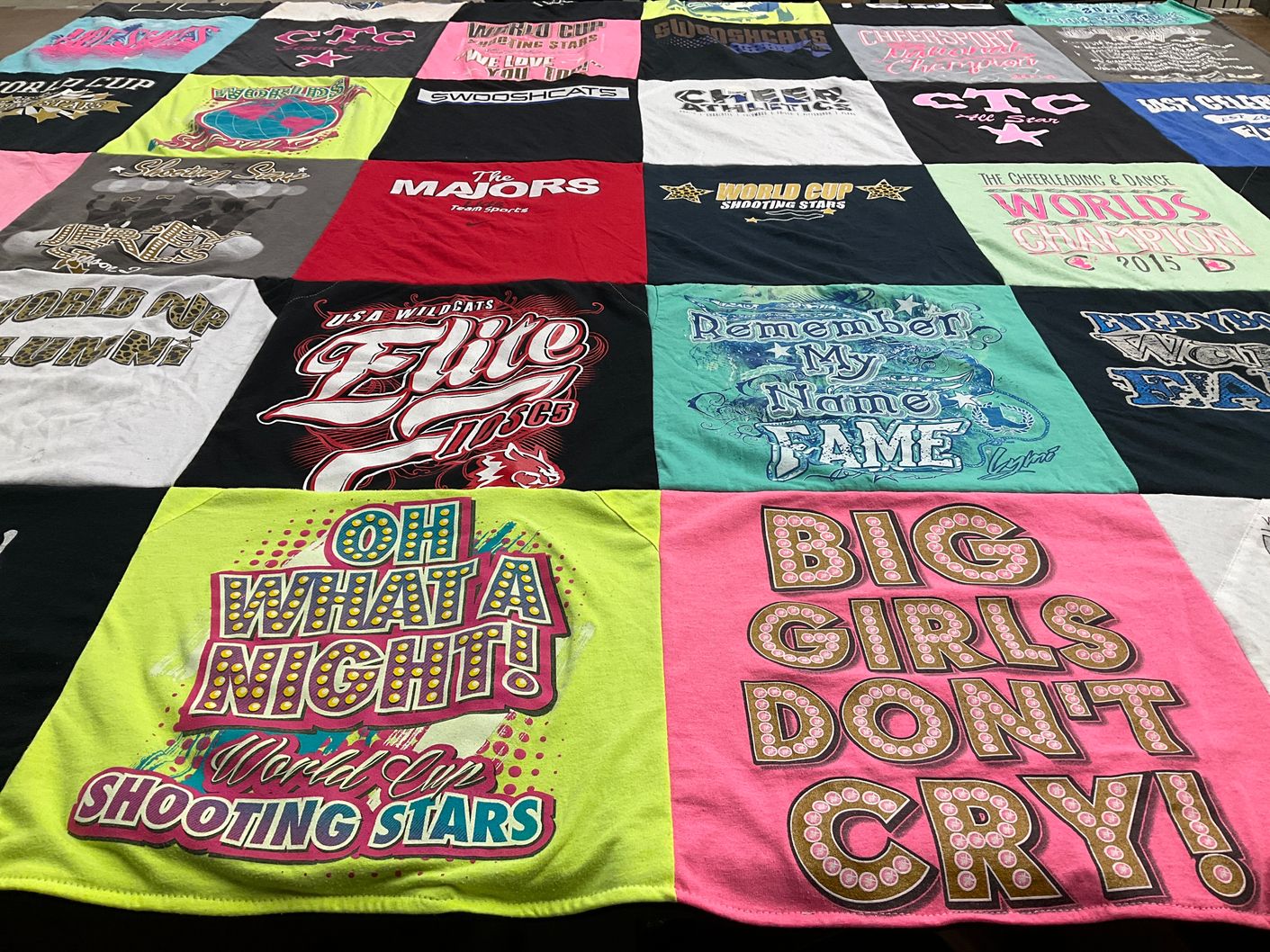 T-shirt quilt with cheerleading, dance themes by Derek from TX