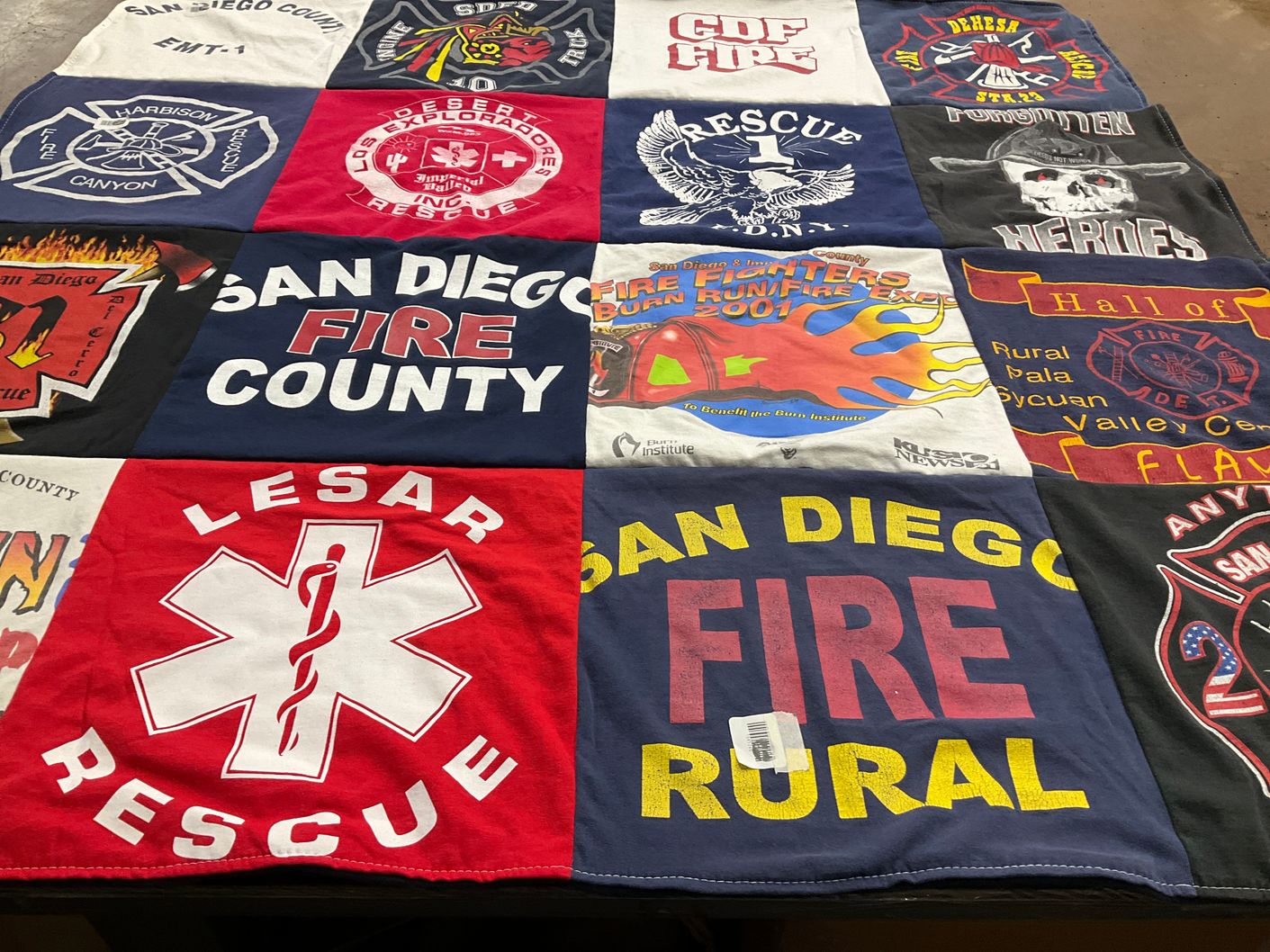 T-shirt quilt with firefighting, rescue operations themes by Colin from CA