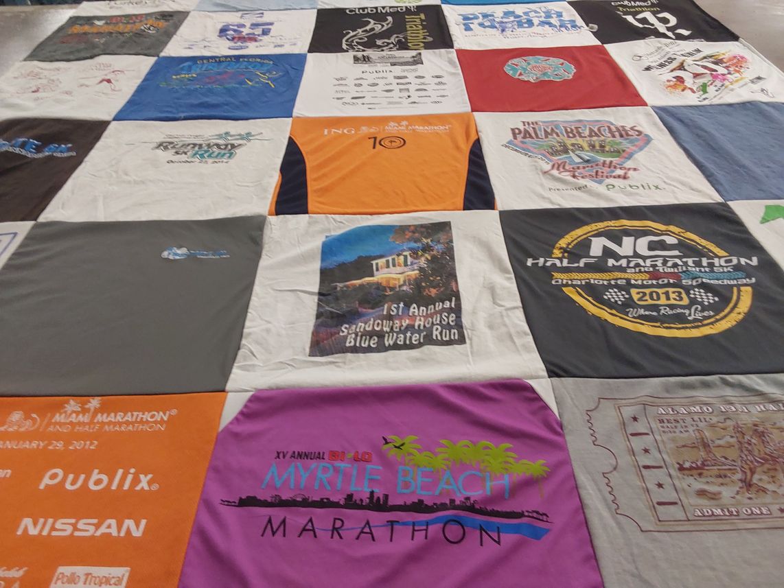 T-shirt quilt with running, sports themes by Sarah from TX