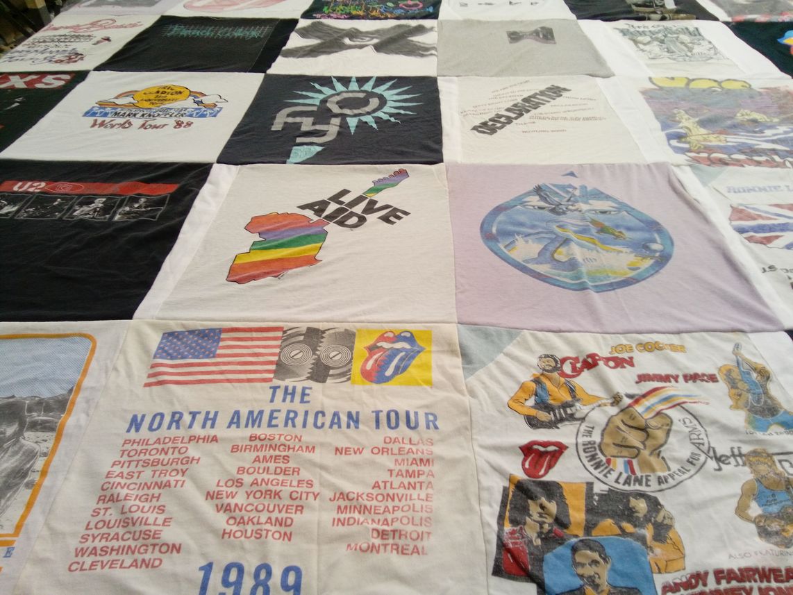 T-shirt quilt with music, concerts themes by Mary from NY