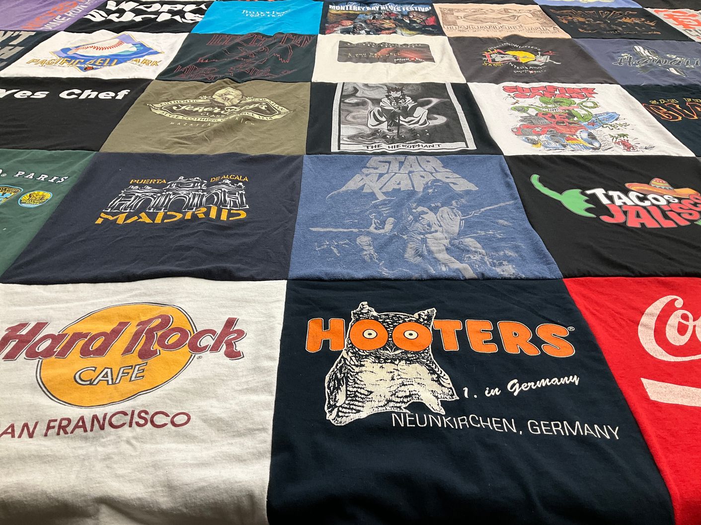 T-shirt quilt with travel, food themes by Enrique from CA