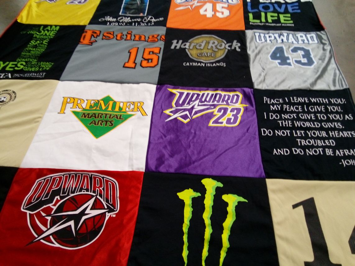 T-shirt quilt with martial arts, basketball themes by Judith from TX