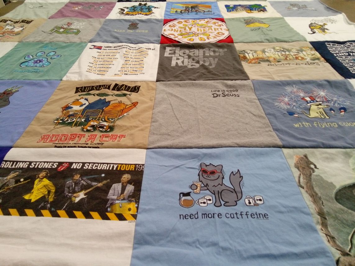 T-shirt quilt with cats, music themes by Cathy from CA