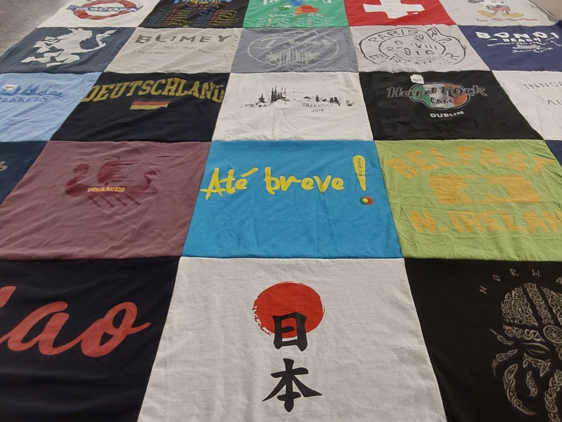 T-shirt quilt with travel, music themes by Richard from TX