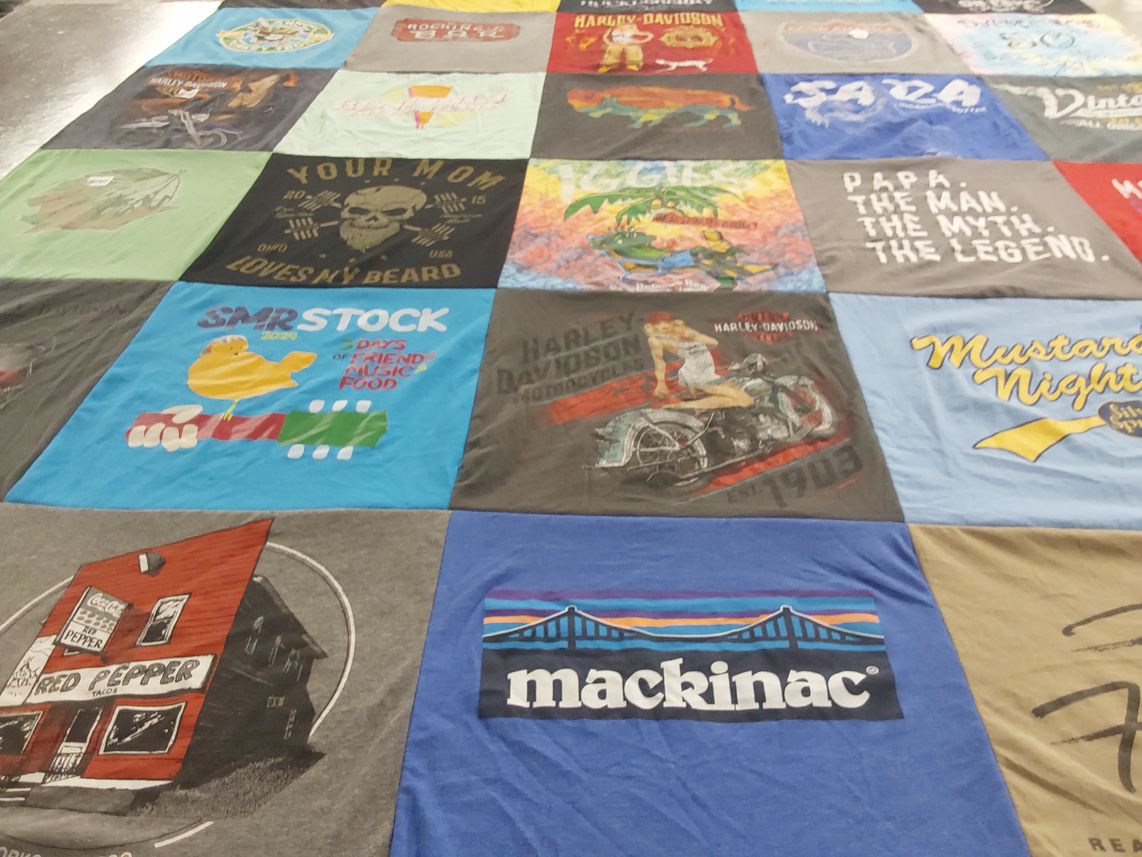T-shirt quilt with motorcycles, music themes by Kent from WI