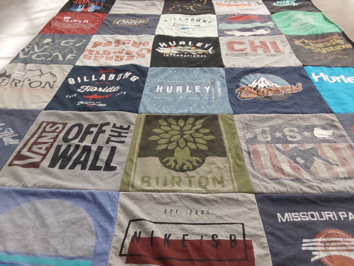 T-shirt quilt with surfing, skateboarding themes by Cameron from AR