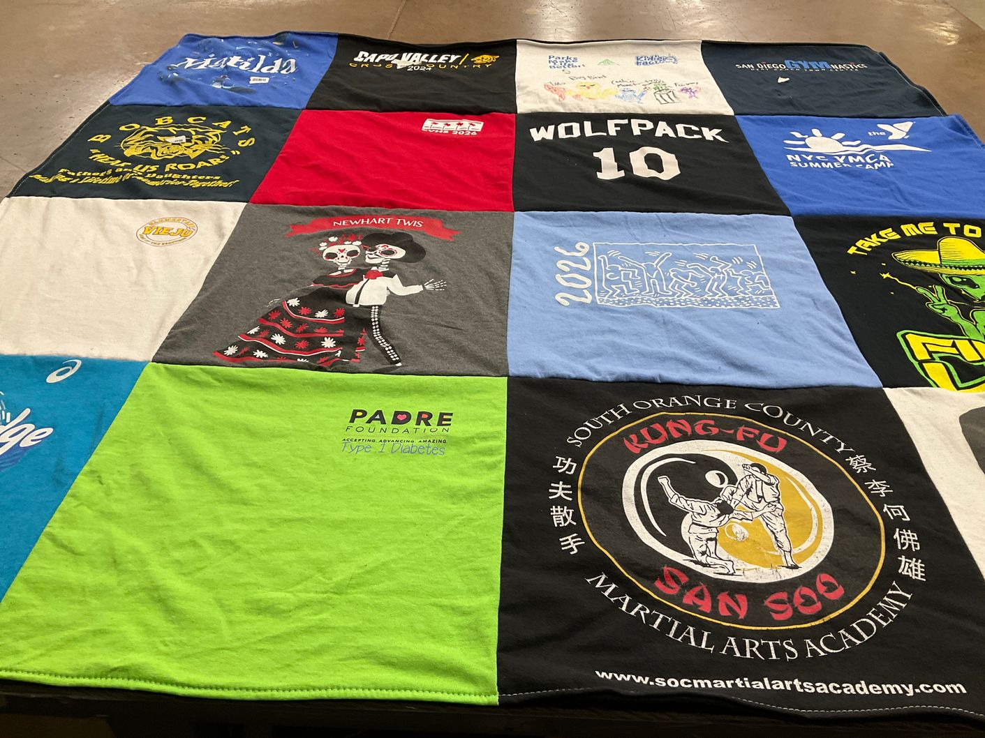 T-shirt quilt featuring wolfpack by Rebeca from CA