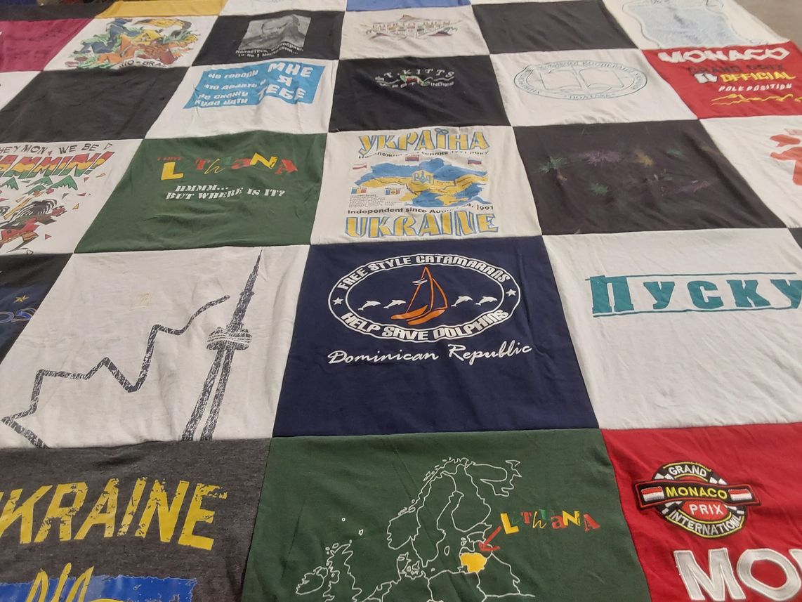 T-shirt quilt with travel, sports themes by Kristina from VA