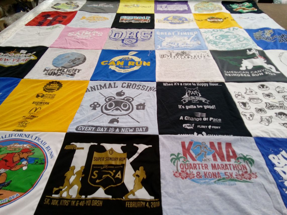 T-shirt quilt with running, hiking themes by Shelly from CA