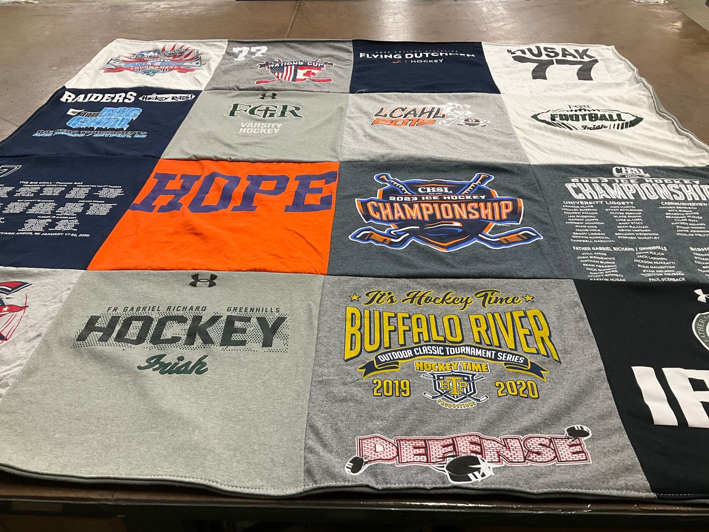 T-shirt quilt featuring varsity hockey by Sarah from MI