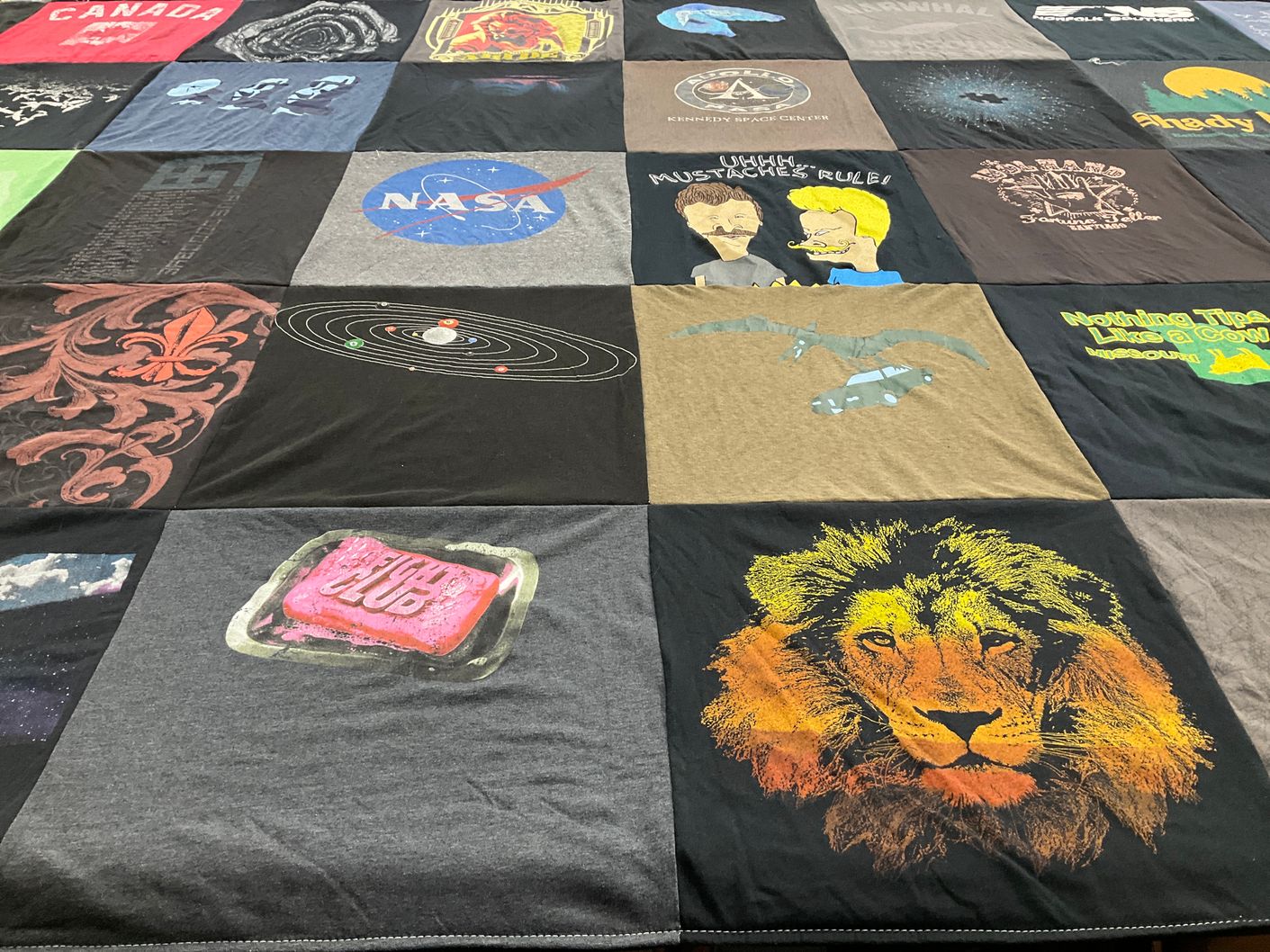 T-shirt quilt with space, animals themes by William from NJ