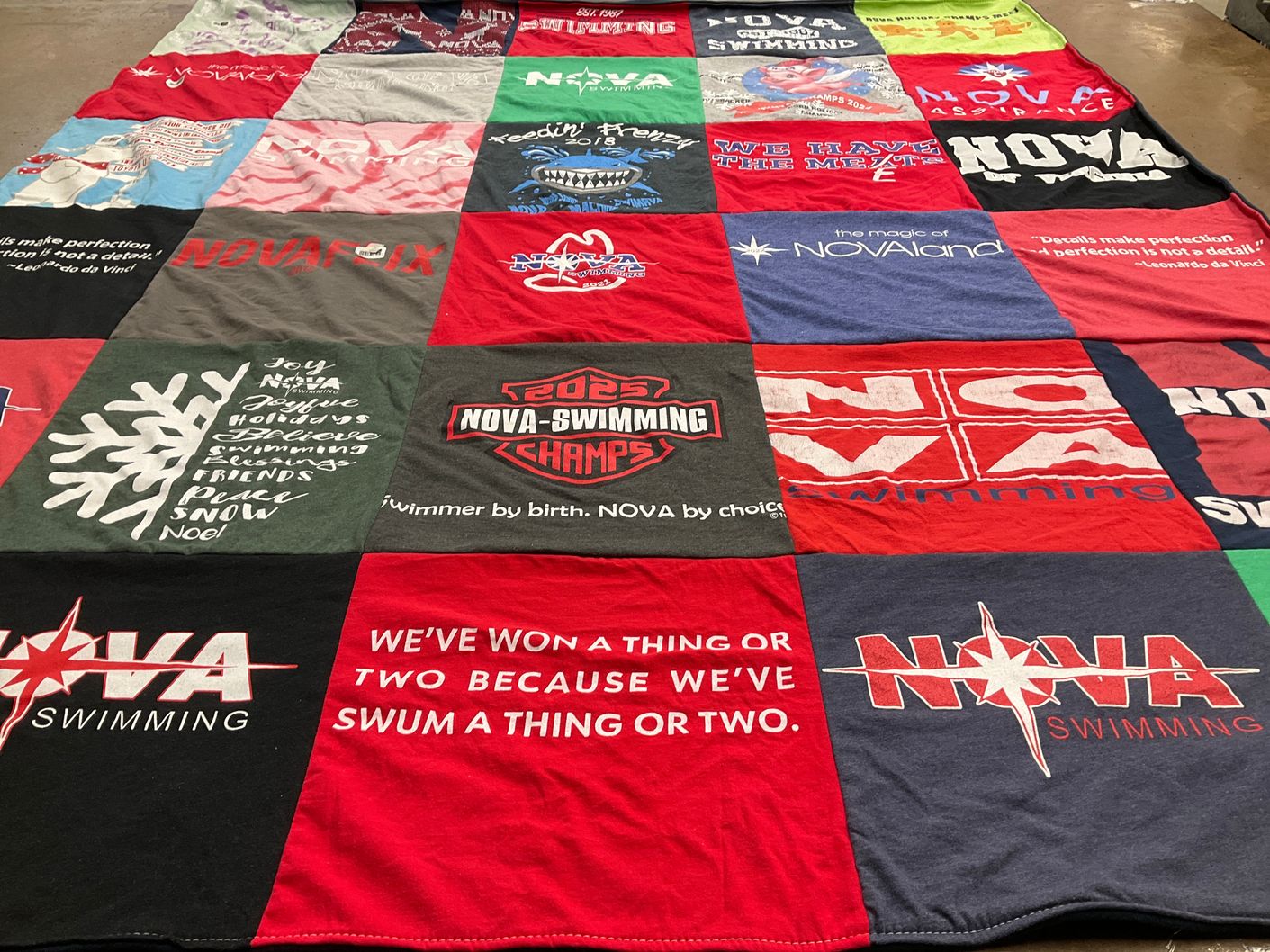 T-shirt quilt featuring nova swimming by Natalie from VA