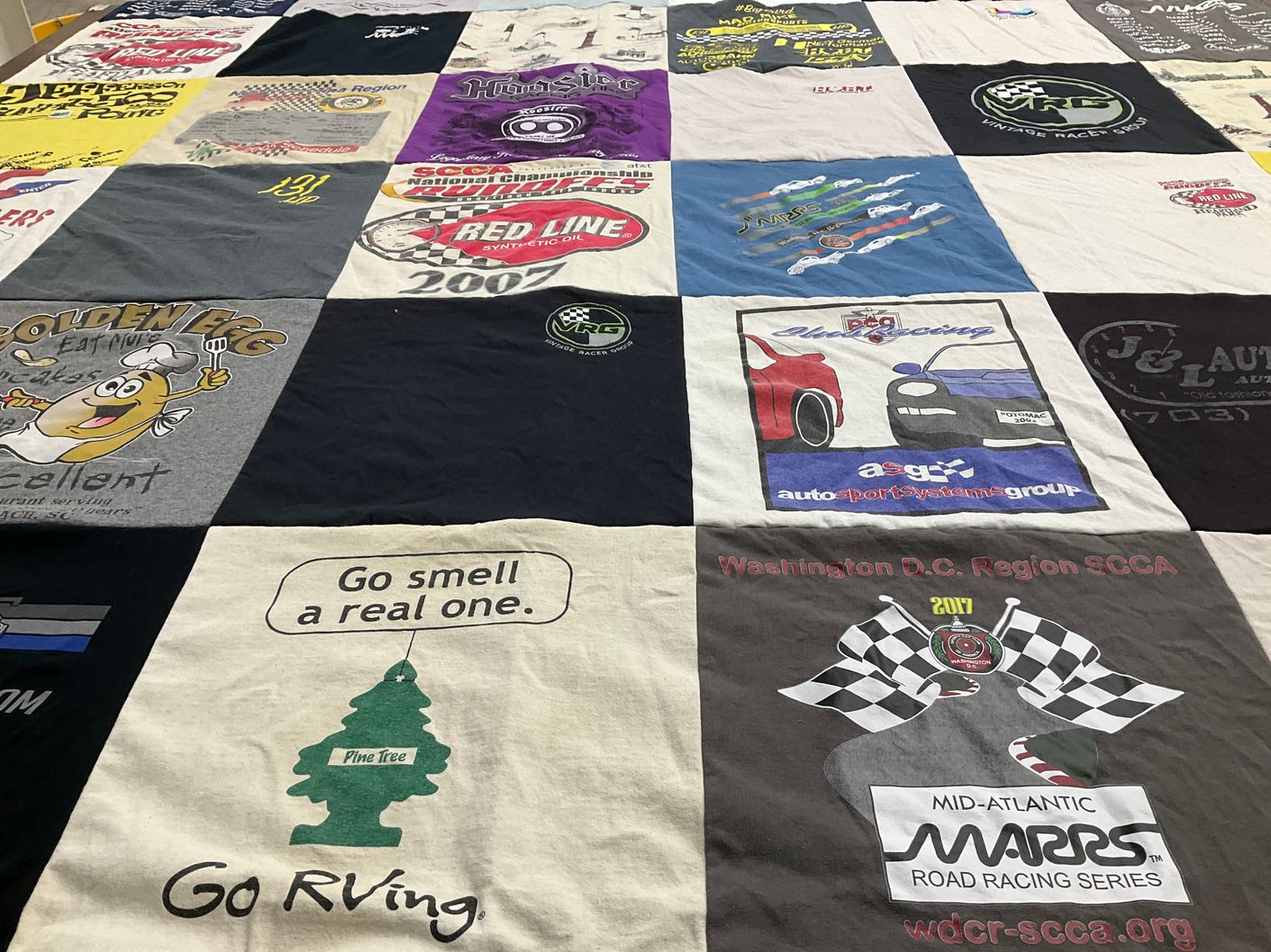 T-shirt quilt with racing, automotive themes by Tracy from PA