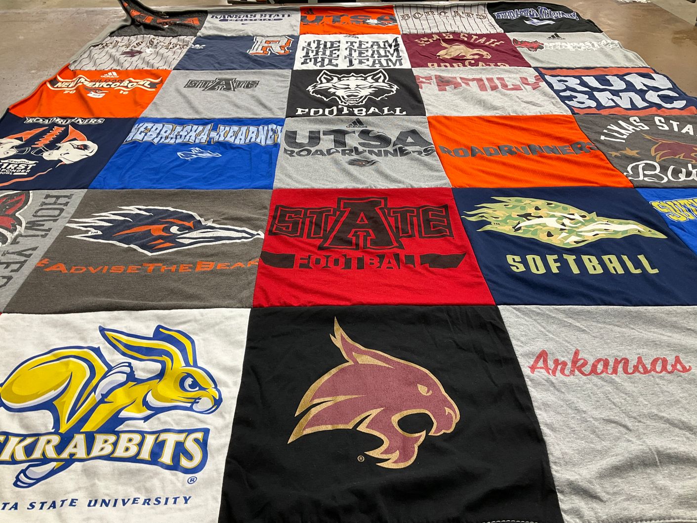 T-shirt quilt featuring arkansas state university, kansas state university by Lydia from TX