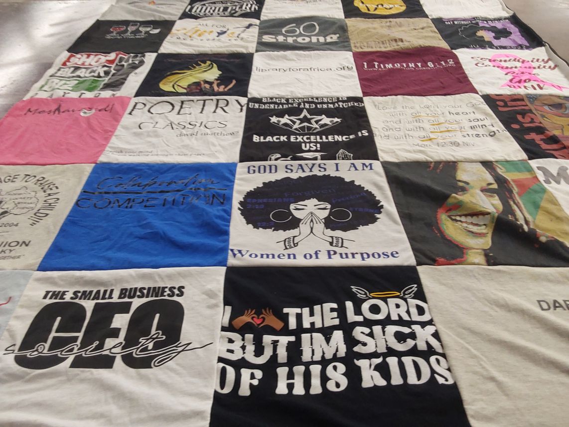 T-shirt quilt with literature, entrepreneurship themes by Rev Daria Dillard from OH