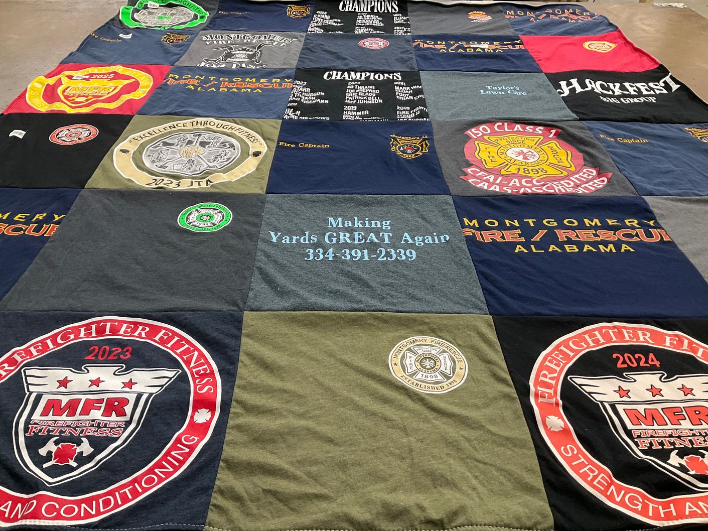 T-shirt quilt with fitness, firefighting themes by Lauren from AL