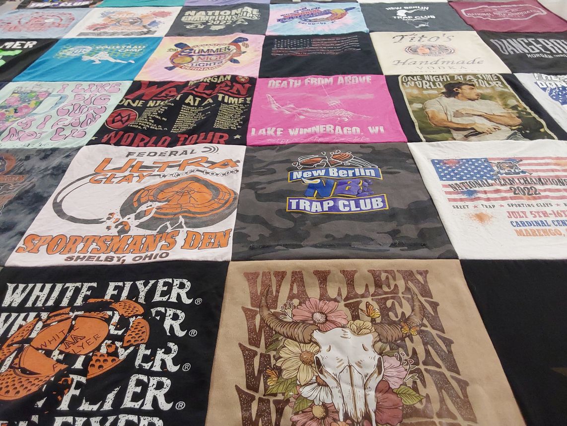 T-shirt quilt with volleyball, trap shooting themes by Lauren from WI