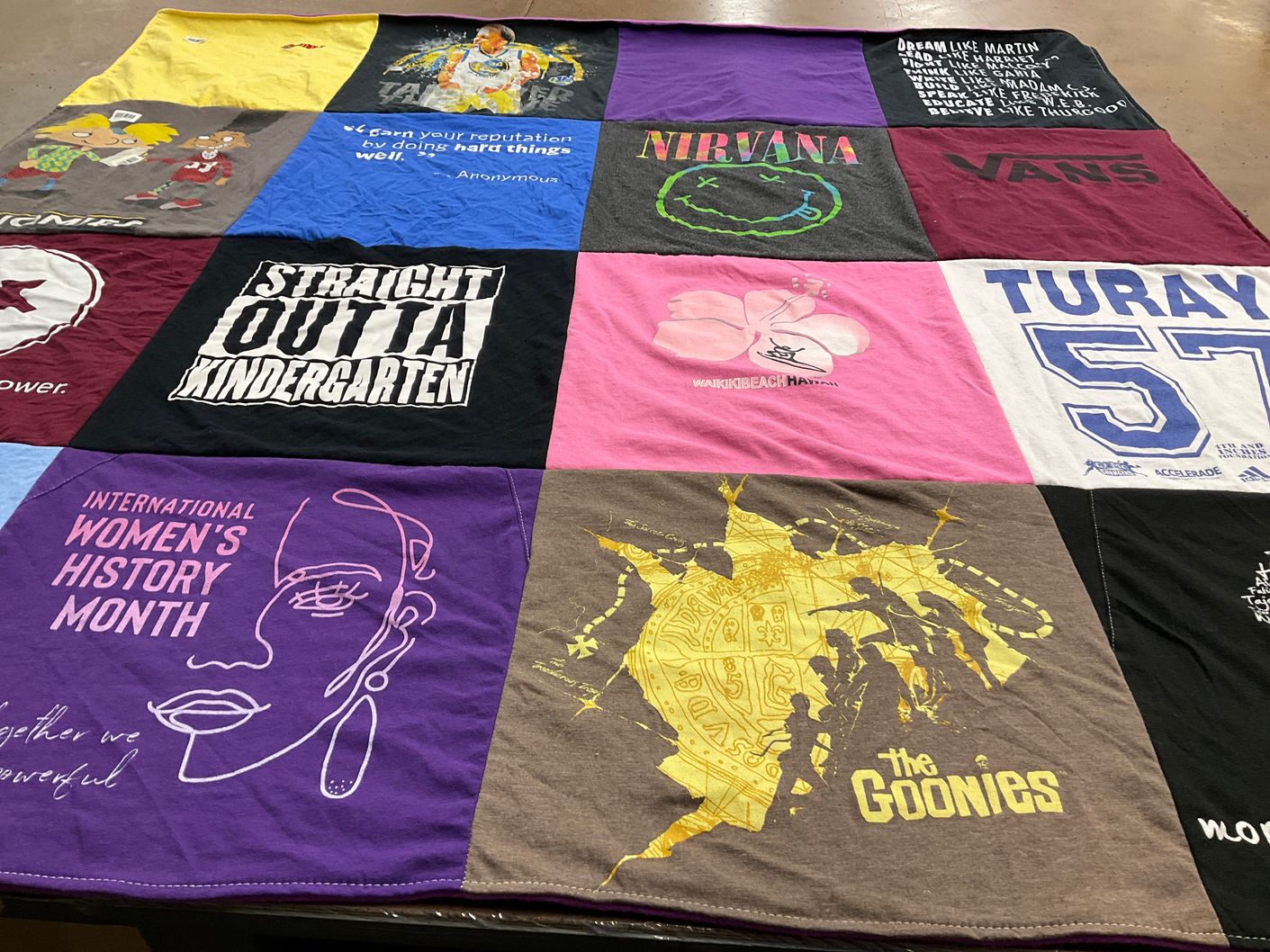 T-shirt quilt with music, education themes by Cora from NJ