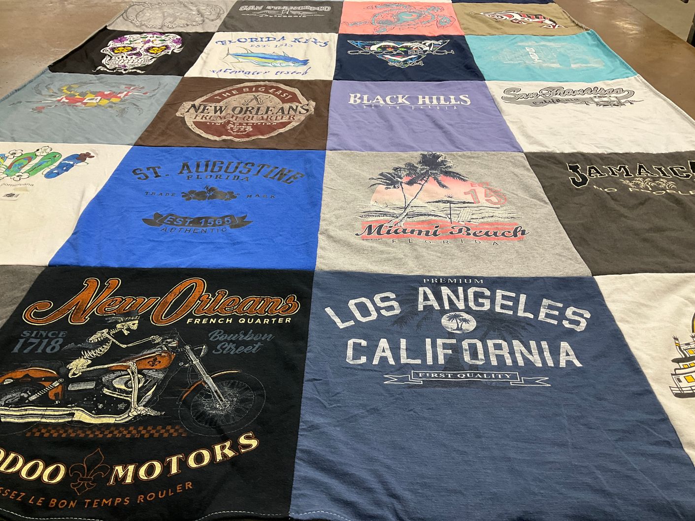 T-shirt quilt with travel, beach themes by Marybeth from IL