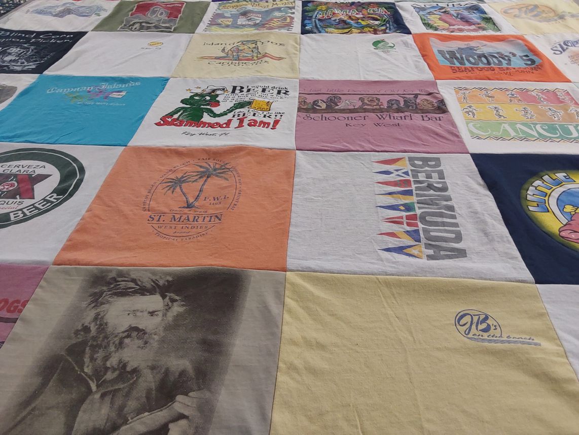T-shirt quilt with travel, beaches themes by Nancy from KY